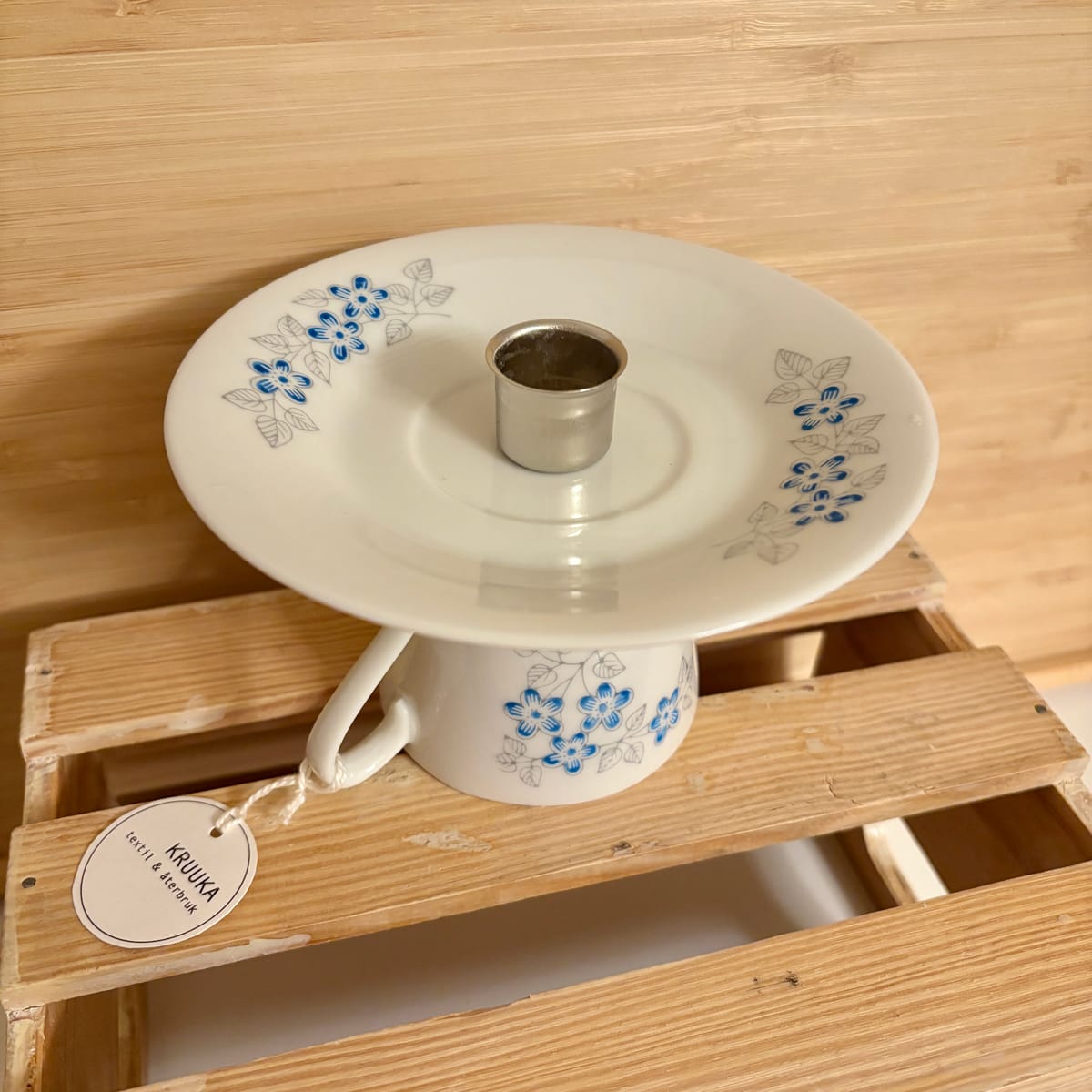 Ljusstake - små blå blomster