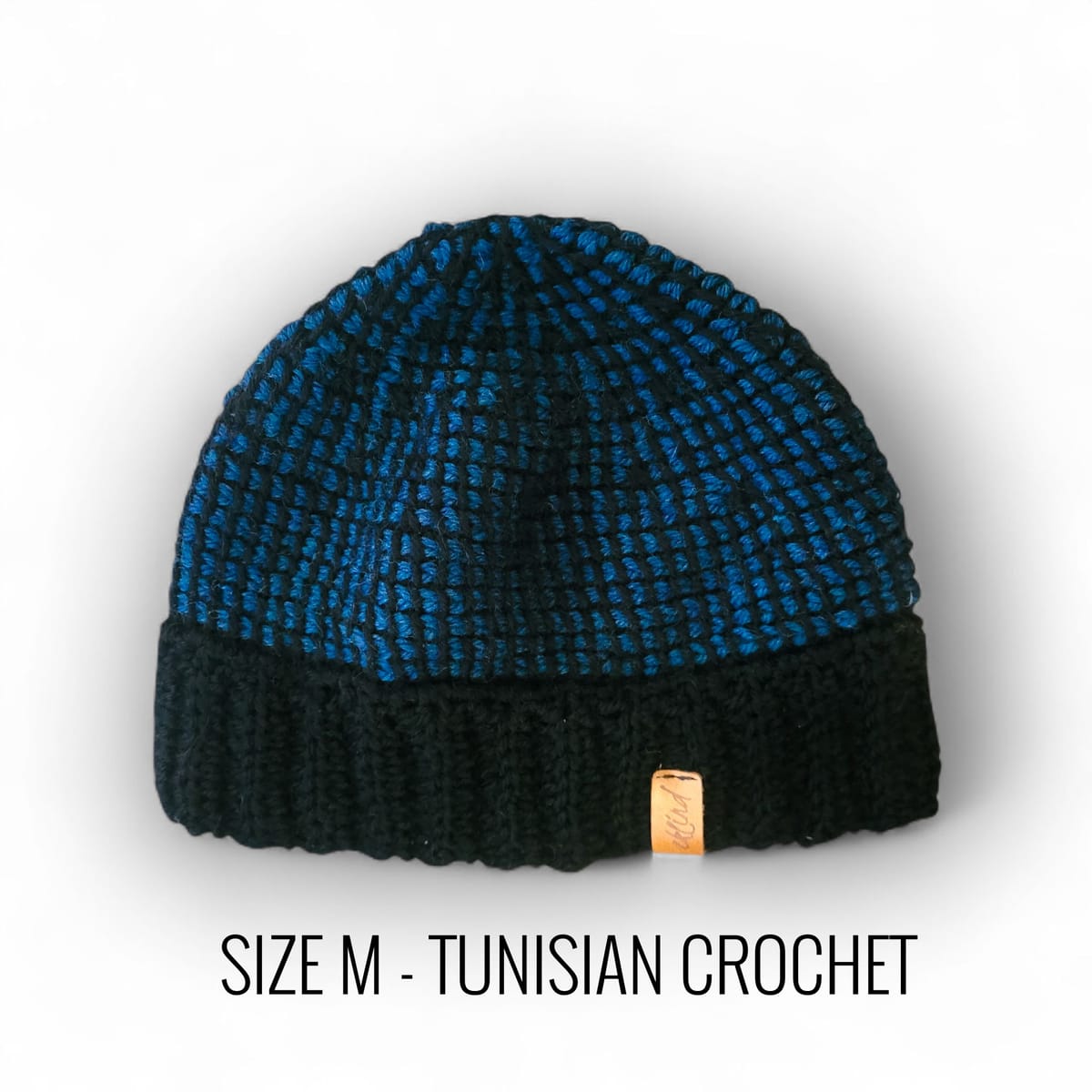 Krokad mössa med virkad mudd