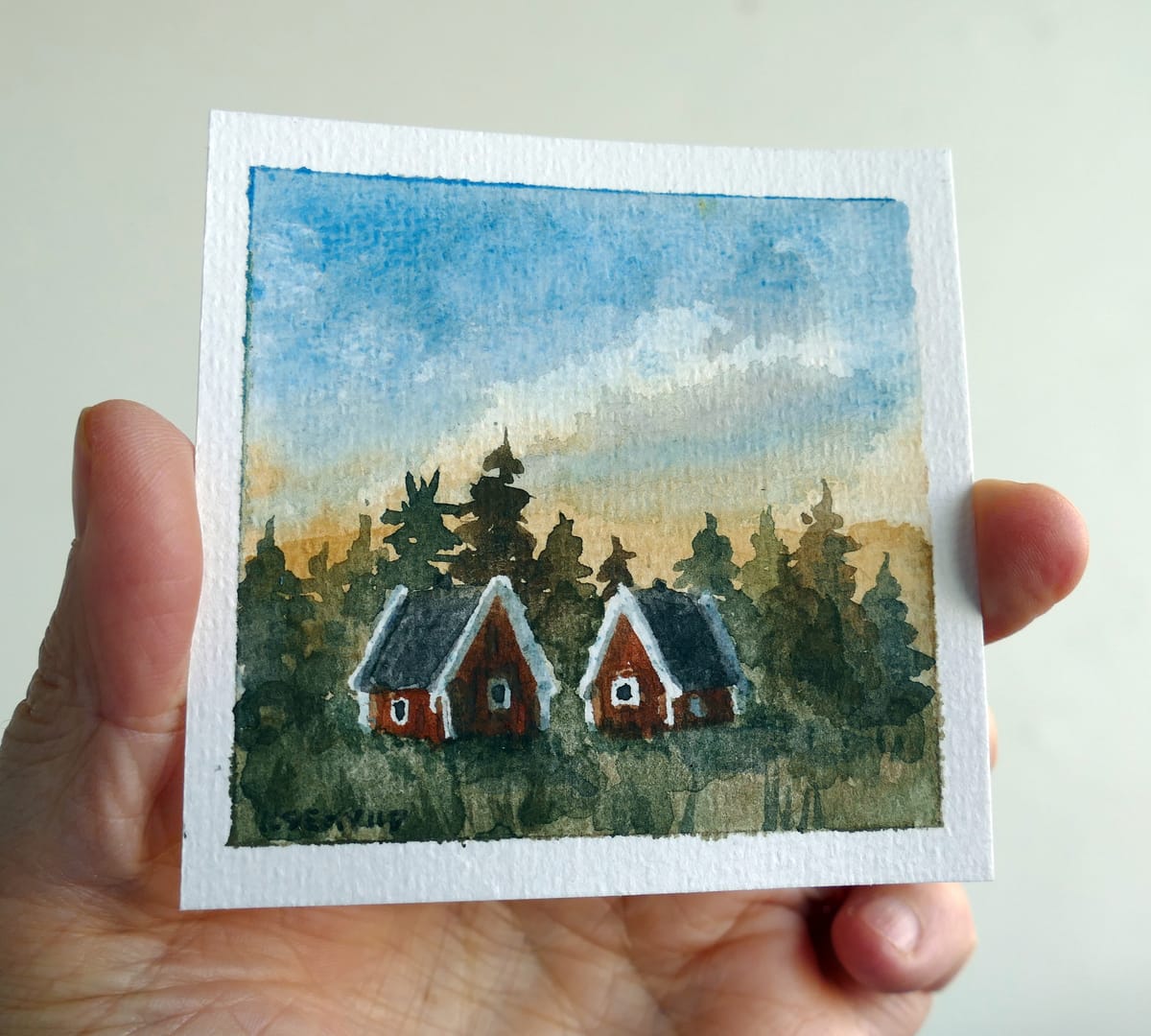 Original akvarellmålning. Röda stugor i skogslandskap