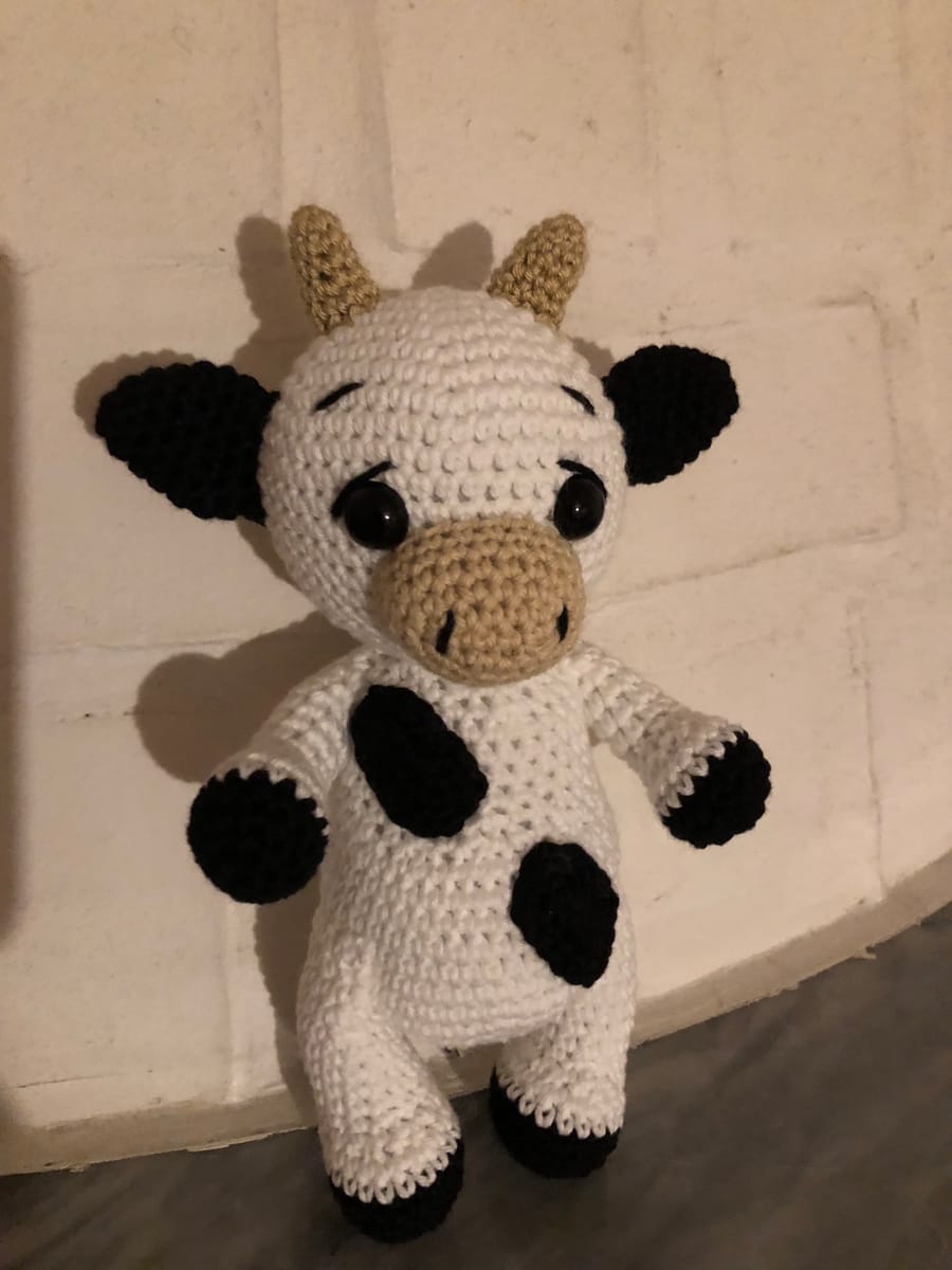 Virkad Vit/Svart Kossa