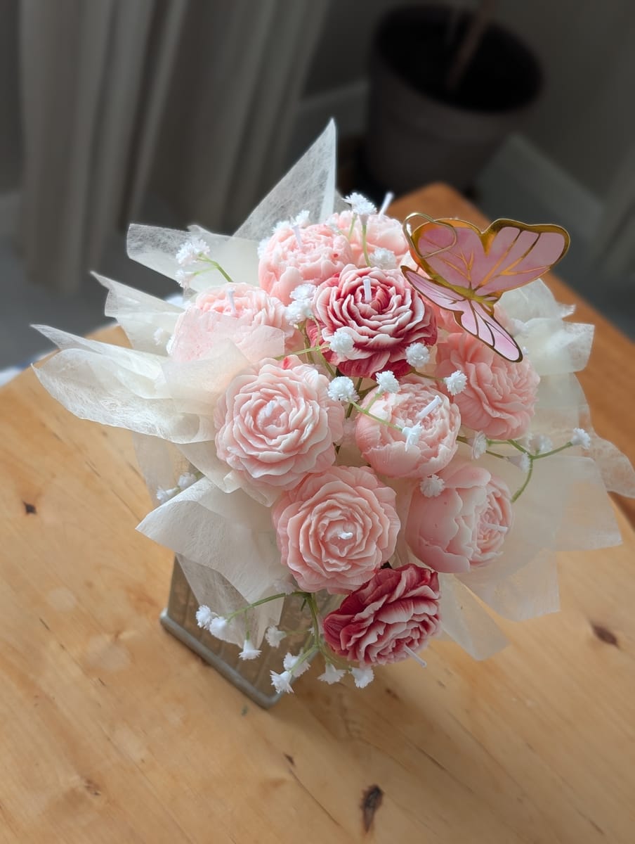 Blomsterarrangemang av ljus