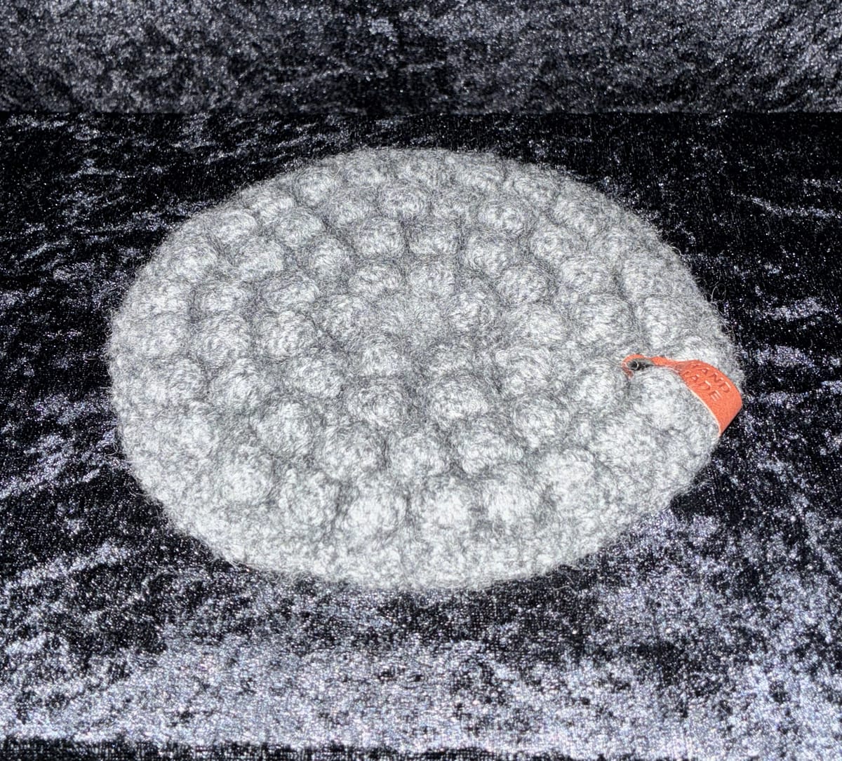 Grytunderlägg i ull