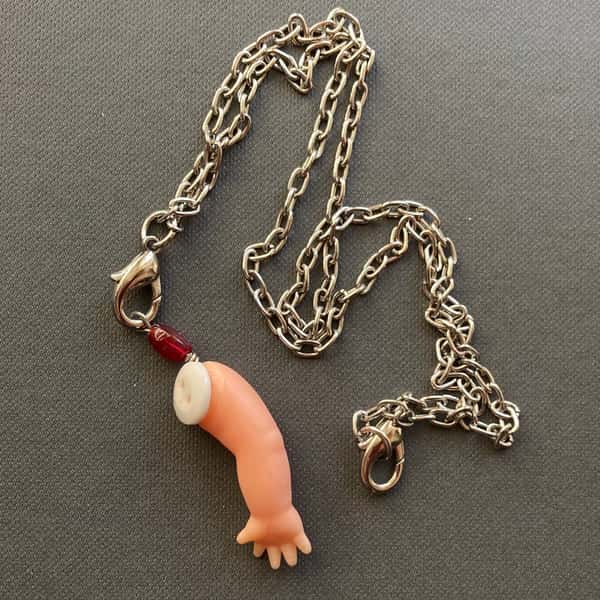 Halsband av återbruk – dockarm