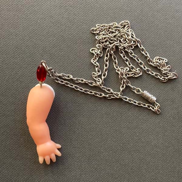 Halsband av återbruk – dockarm