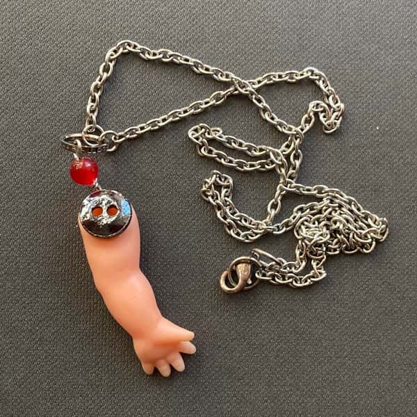 Halsband av återbruk – dockarm