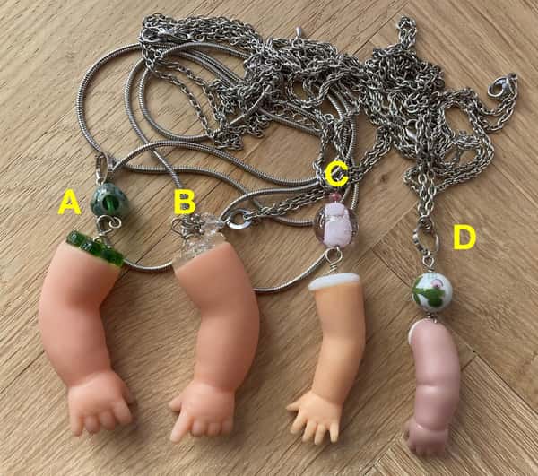 Halsband av återbruk – dockarm