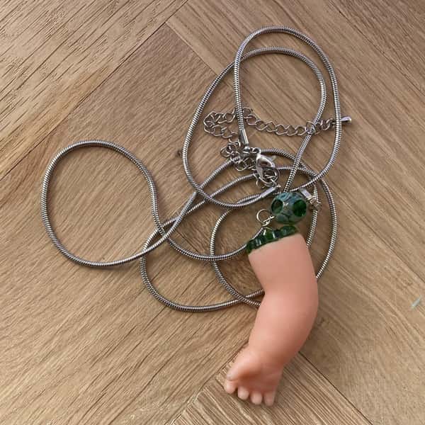 Halsband av återbruk – dockarm