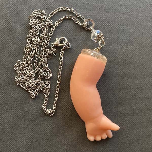 Halsband av återbruk – dockarm