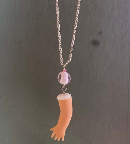 Halsband av återbruk – dockarm