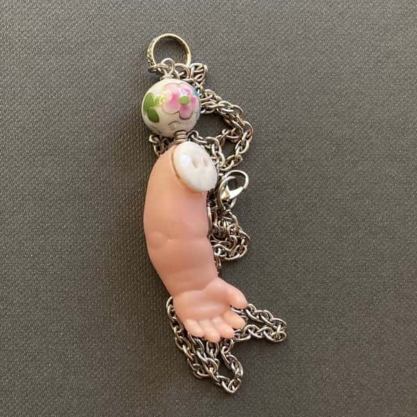 Halsband av återbruk – dockarm