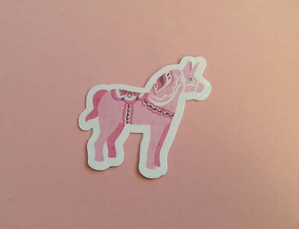 Klicker märke med rosa dala enhörning, laminerat med stjärnor