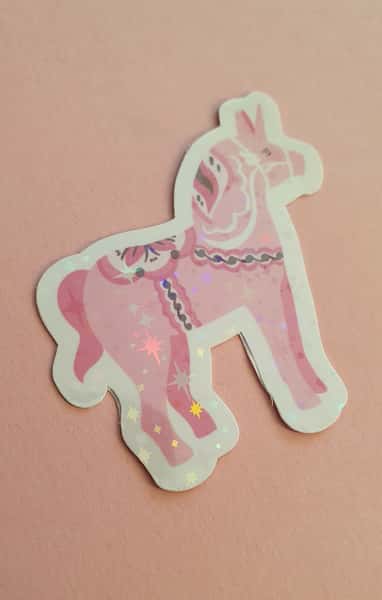 Klicker märke med rosa dala enhörning, laminerat med stjärnor