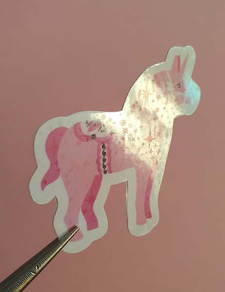 Klicker märke med rosa dala enhörning, laminerat med stjärnor