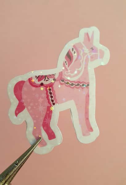 Klicker märke med rosa dala enhörning, laminerat med stjärnor