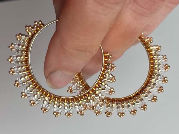 Handmade crescent moon hoop earrings in pink and silver colors, lightweight stainless steel earrings with Miyuki Delica beads