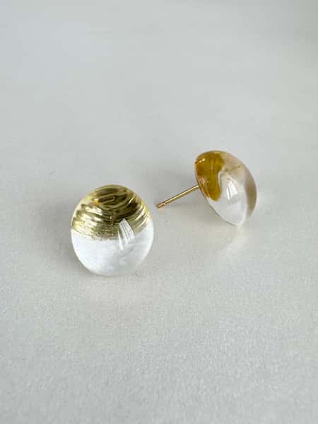 Pearlescent white and gold stud earrings with hypoallergenic steel posts