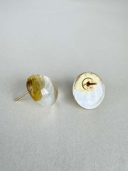 Pearlescent white and gold stud earrings with hypoallergenic steel posts
