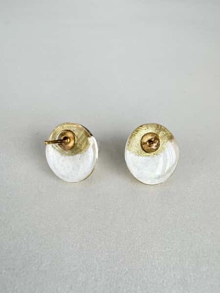 Pearlescent white and gold stud earrings with hypoallergenic steel posts