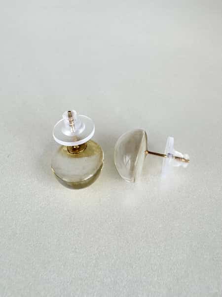 Pearlescent white and gold stud earrings with hypoallergenic steel posts