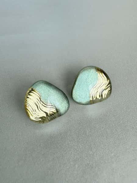 Light sage green and gold stud earrings with hypoallergenic steel posts