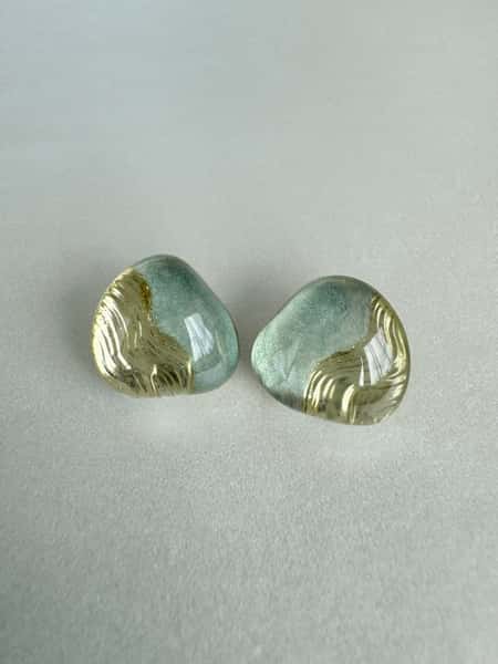 Light sage green and gold stud earrings with hypoallergenic steel posts