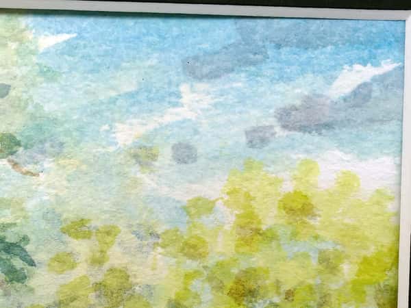 Akvarell original i svart passepartout. Skogsgläntan