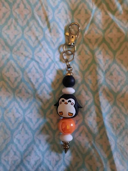 Väskaccessoar med karbinhake