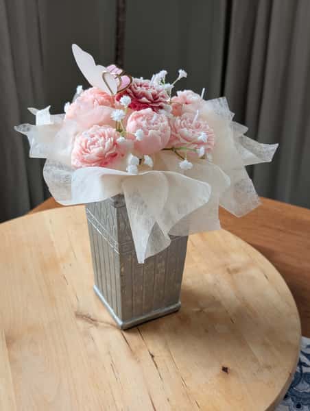 Blomsterarrangemang av ljus