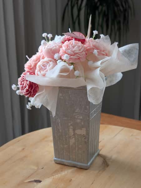 Blomsterarrangemang av ljus