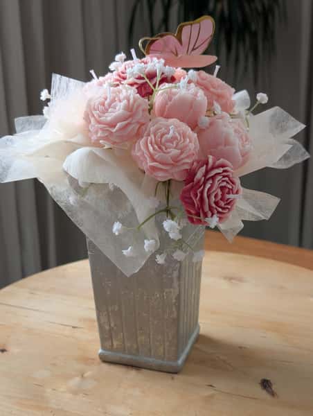 Blomsterarrangemang av ljus