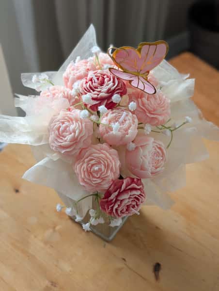 Blomsterarrangemang av ljus