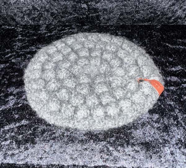 Grytunderlägg i ull