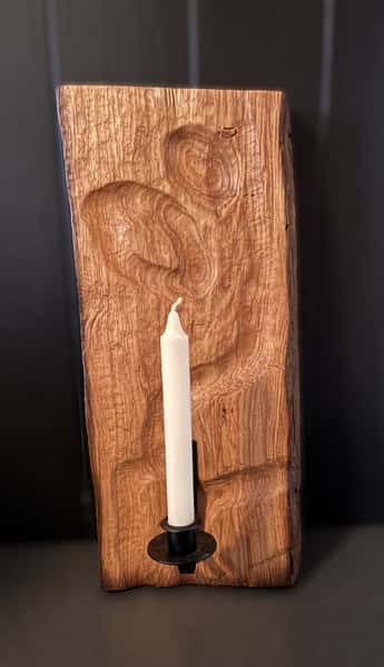 Väggdekoration med ljushållare