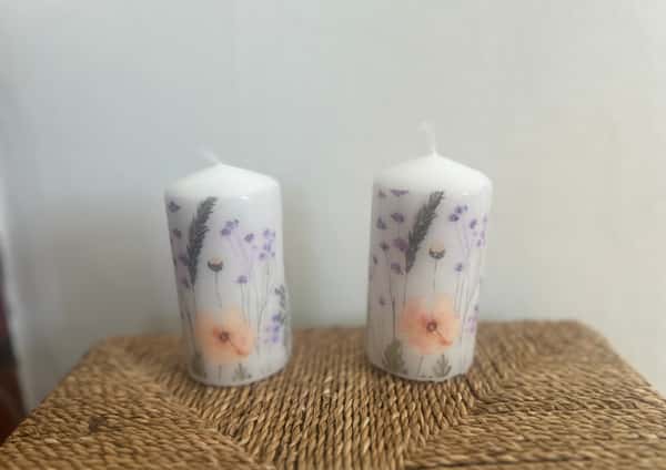 Ljus med handgjord dekoration